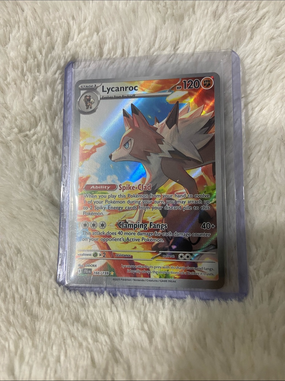 Lycanroc 166/159 illustration rare card from the SV09: Journey Together set.